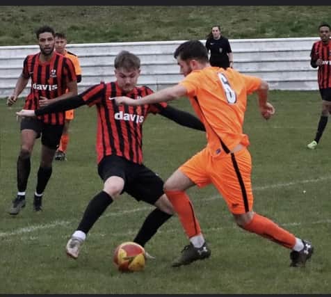 Action from Shirebrook's clash with Athersley.