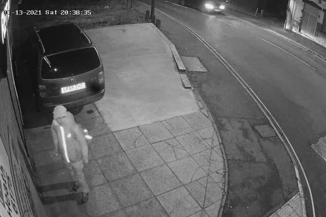 CCTV captured a person spraying painting graffiti on the wall at the side of Sweet Retreat, High Street in Clay Cross.