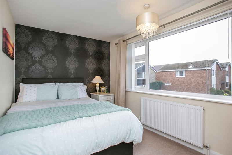 A front-facing bedroom which is fitted with a central heating radiator and a PVCu double-glazed window.