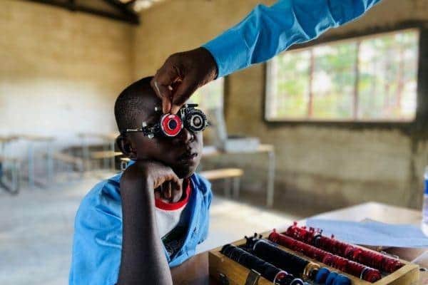 Child receiving eyecare with Vision Action
