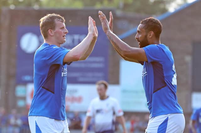 Danny Rowe is congratulated by Stefan Payne after his goal against Matlock Town. Picture: Tina Jenner.