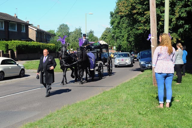Mourners lined the streets as Louise Smith's funeral procession made its way around Leigh Park. Picture: Sarah Standing (100720-1374)