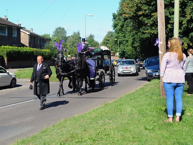 Mourners lined the streets as Louise Smith's funeral procession made its way around Leigh Park. Picture: Sarah Standing (100720-1374)