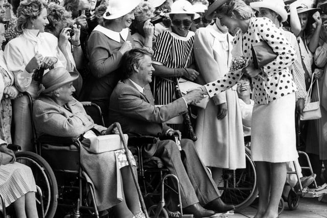 Princess Diana meets people gathered to see her at Chatsworth in July 4th 1986.