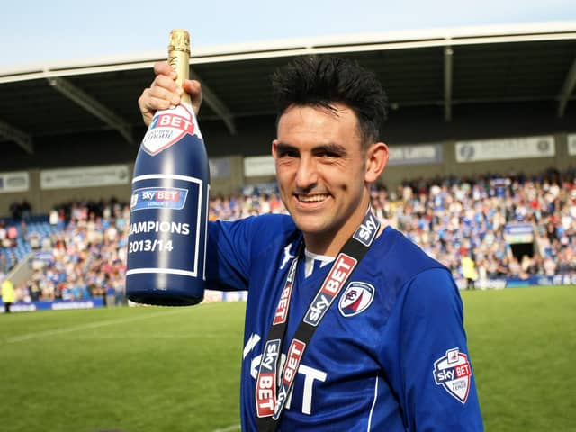 Gary Roberts celebrates after Chesterfield won the League 2 Championship in 2013/14.