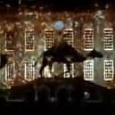 Camels progress across the side of Chatsworth House in the Advent calendar themed light show.