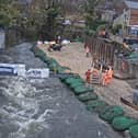 The reconstruction of the wall requires careful engineering to protect riverside premises.