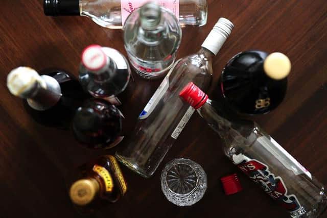 Party-goers greeted police with drinks and bottles of spirits in hand and tried to shut officers out of the property