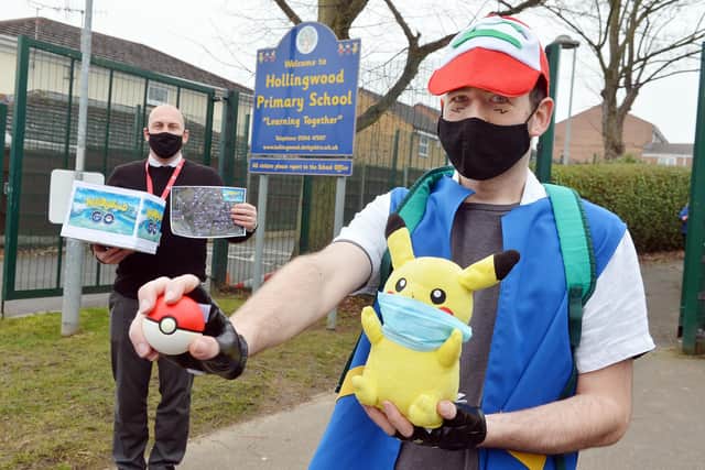 Hollingwood Primary School's new Pokemon-style game for children. Ian Holmes, deputy headteacher, and Guy Dopson, student teacher, with the game.