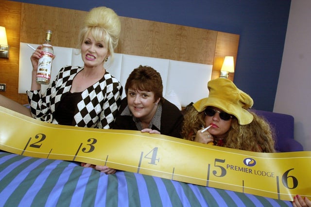Patsy and Edina give Premier Lodge manager Ruth Cartlidge a helping hand as their new hotel opened at Meadowhall with some of the biggest beds in the industry available to guests. Pictured in 2001