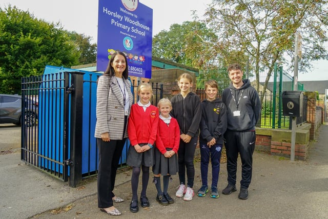 Mrs Atwal said: “We want our school environment to inspire our children to learn to the best of their potential and to be proud of their achievements.” Above headteacher Atwal is with pupils and assistant head Harry Rickels.