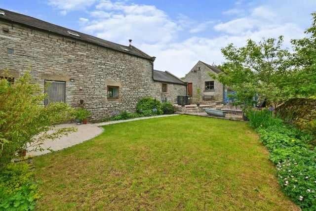 The rear garden has a generous sized lawn with an additional patio which can be accessed from the kitchen.