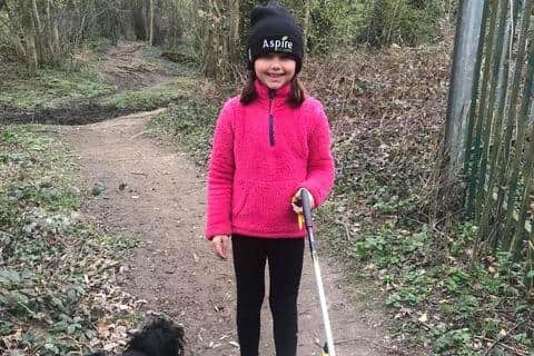 Isla Hutchinson, eight, has been clearing litter around Tupton Hall School and in North Wingfield