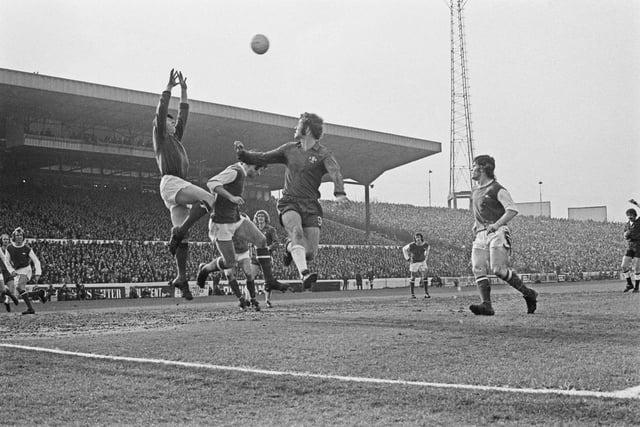 Born October 30, 1941, Bob Wilson attended Chesterfield Grammar school and later enjoyed an 11 year-long career with Arsenal, being part of their 1970/71 double winning side. After retiring as a player, he turned to coaching and broadcasting and presented football programmes for 28 years. Here he is pictured here during Arsenal's 2-1 FA Cup quarter-final win over Chelsea in 1973.