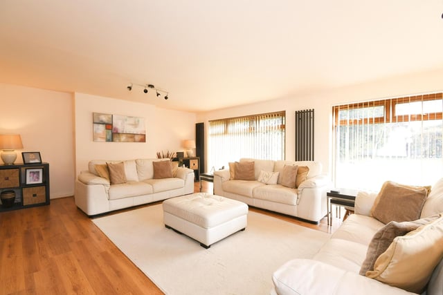 Sit back and relax in this modern space, ideal for catching up on family news.