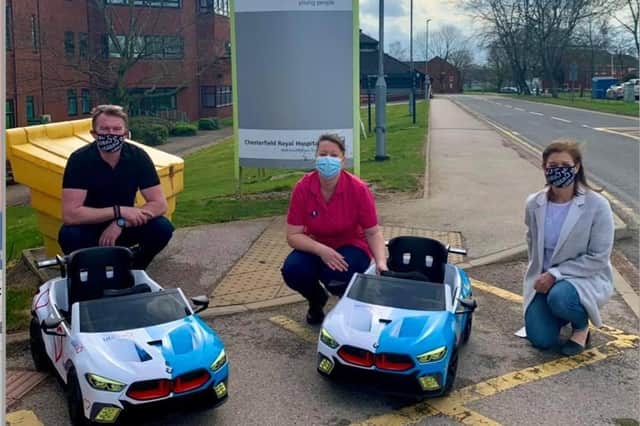 Photo: Paul Taylor (left), Head of Telesales at the Utilita Office in Chesterfield, gifting Chesterfield Royal Hospital with the electric ride-on cars for children to enjoy