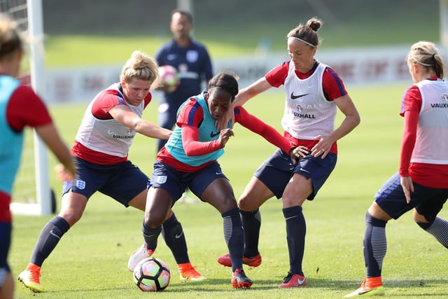 Bright (left) would make her full England debut in 2016 and is pictured here training at St George's Park.