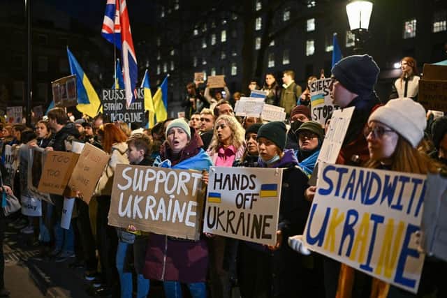 People demonstrate in support of Ukraine in Whitehall outside of Downing Street the residence of the Boris Johnson on February 25, 2022 in London. Photo by Jeff J Mitchell/Getty Images