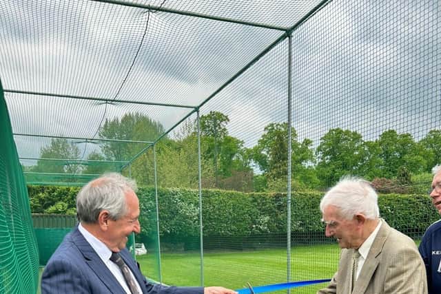 Clarry and Derek remove the ribbons and open the nets. Photo: Matlock and Cromford Meadows Cricket Club