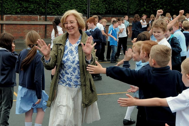 Ann Hill saying her farewells to pupils at Granby Junior school, Ilkeston