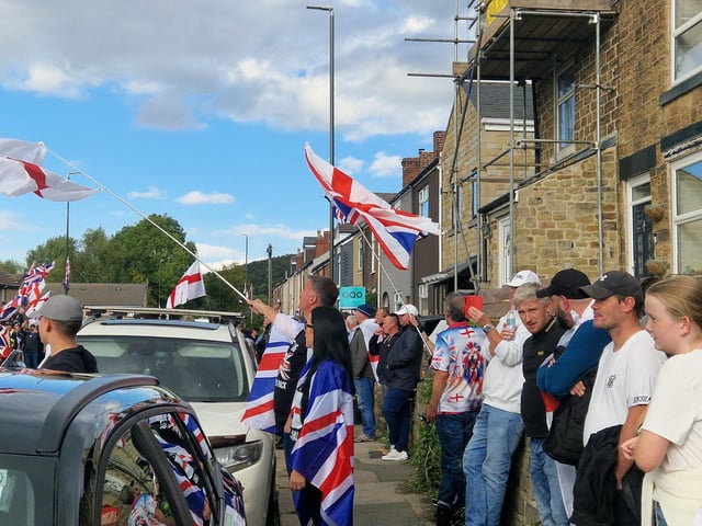 Hundreds of people wearing England and Union Jack flags were seen shouting ‘get yourself out of here’ and ‘come back where you came from’.