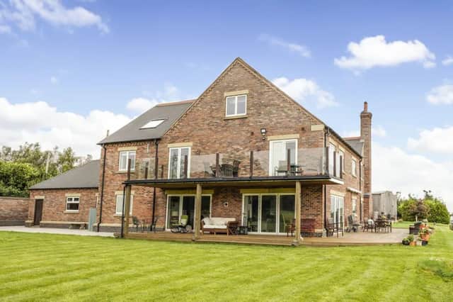 Accessed via a picturesque driveway bordered by open fields and hedgerows, Ladywood Farm is a stunning and extensive family home.