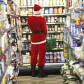 Santa Claus standing in supermarket
