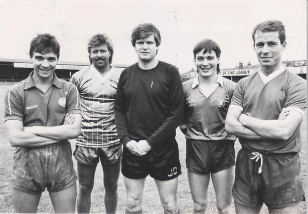 John Duncan (centre) shows off some new signings during his first spell as Chesterfield manager.