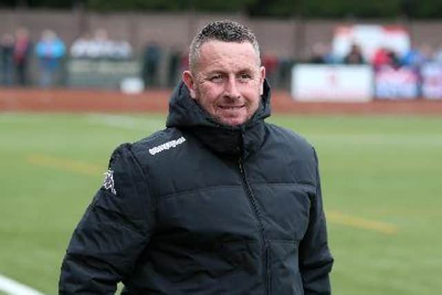 Paul Phillips is casting his player search far and wide as he looks to improve Matlock Town.
