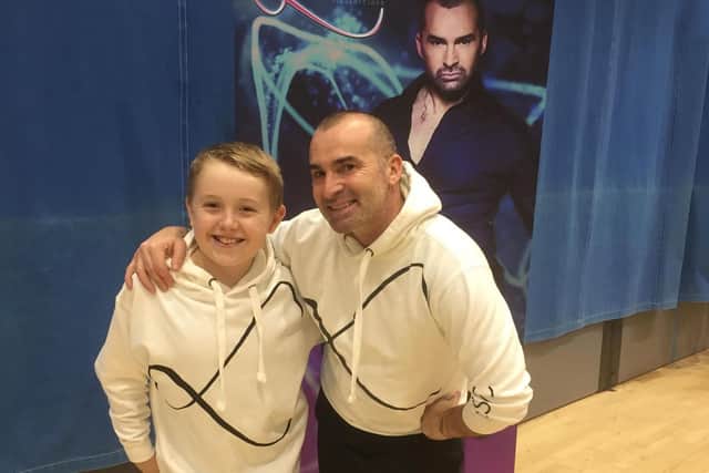 Cole Phillips with Louie Spence at a masterclass.