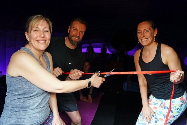 Chris and Gemma, pictured here with customer Claire Hobson, as they cut the ribbon to open the studio.