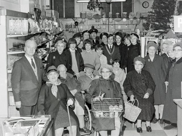 Derbyshire residents visit Woolworths, December 1971.