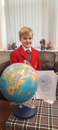 Harry, 7, has been writing a short story each day for a fortnight and has raised £1000 to combat climate change.