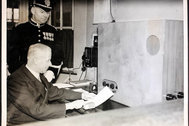 Colonel Brook, Government Inspector of Constabulary, sending out the first message from the new police wireless station at the Police Headquarters in Chesterfield. Colonel Brook opened the station, the first of many sub-stations, to be linked up with Nottingham, where the head wireless station is established.  (Photo by George W. Hales/Fox Photos/Hulton Archive/Getty Images)