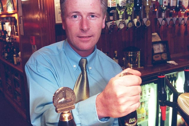 Stage hypnotist and ex-footballer Pat Heard running the Friar Tuck pub at Calow in 2OOO.