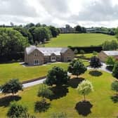 Moorside View is set in 1.88 acres of landscaped grounds and enjoys views over the village of Holymoorside and surrounding countryside.