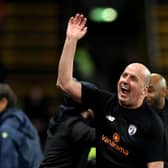 Paul Cook on the touchline at Vicarage Road. (Photo by Richard Heathcote/Getty Images)