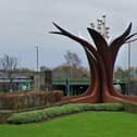 Melanie Jackson's sculpture Growth, on Horns Bridge Roundabout, is featured on Chesterfield art Trail. It says: "The sculpture signifies the confidence and continuous growth of the town. The wheel design in the ground represents the town's many industries, both past and present, and twists upwards at the centre to form an emerging flower."