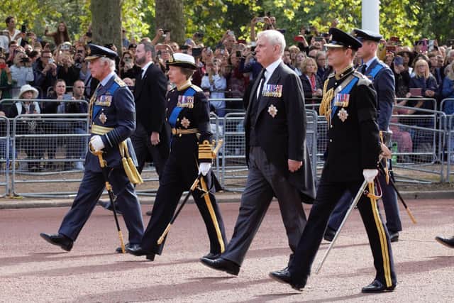 The King with Princess Anne, Prince Andrew and Prince Edward. They were followed by the Queen’s grandsons, Peter Phillips, Prince William and Prince Harry.