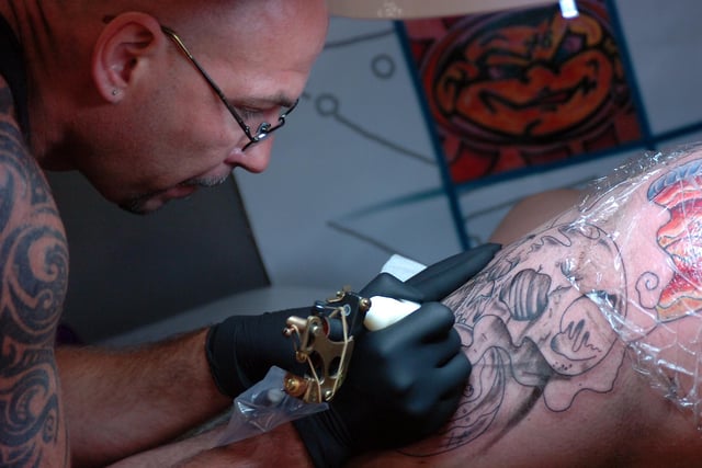 Tattooist at work: Mel Herbert applied the design in 2009