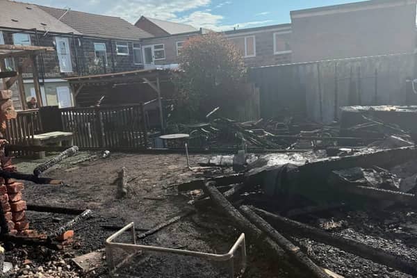 The aftermath of the fire which destroyed the rear garden at Lydia's  cafe on Market Street, Clay Cross.