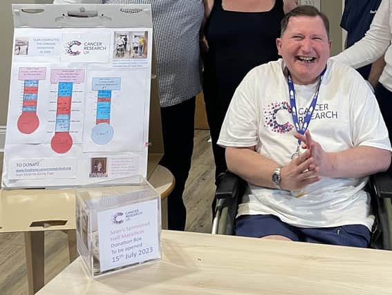 Sean is all-smiles after completing his fundraising challenge