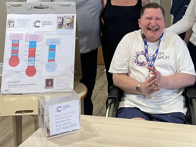 Sean is all-smiles after completing his fundraising challenge