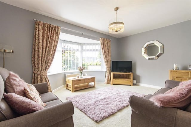 The living room offers a touch of luxury, don't you think? It is also a fine size, with a bay window overlooking the back garden.