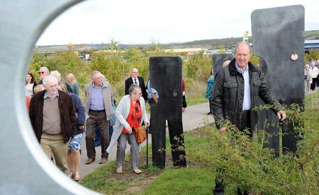 Relatives of miners visited the Walking Together memorial before the pandemic.