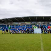 Teams line up for the charity match at Chesterfield FC. Photo: Tina Jenner.