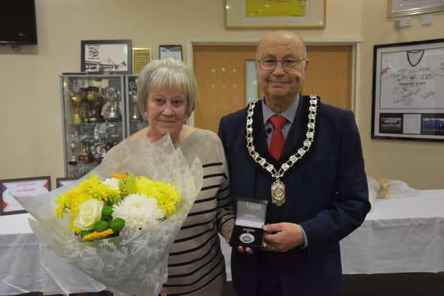 Pictured is Rose Bowler receiving the Honorary Alderman title from Council Chair, Councillor Tom Munro.