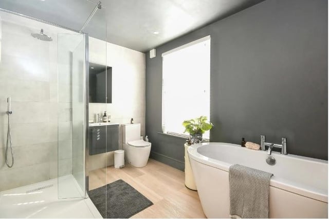 A luxurious bathroom fitted with a modern suite comprising bath, basin and wc, with separate shower cubicle, is on the first floor. There is also a shower room downstairs.