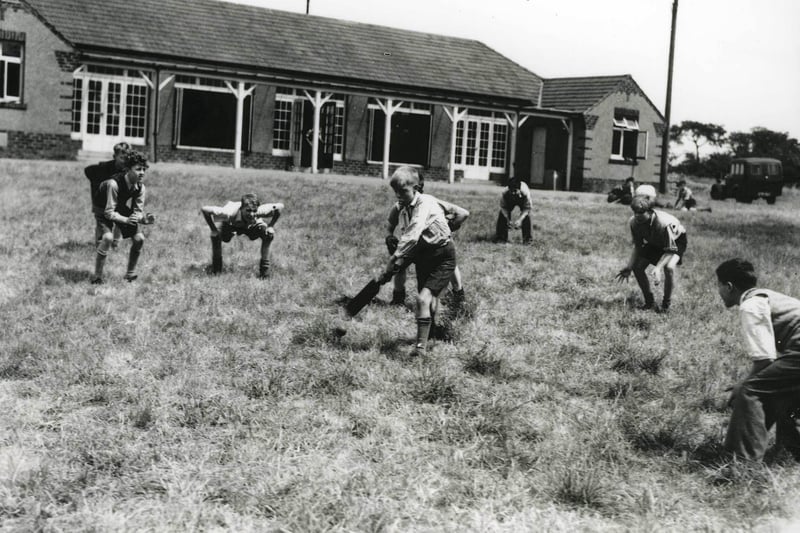 Youngsters enjoy a game of cricket during their holiday at Carlton Camp. The haven for children from Hartlepool, though, also came with stories of a grey lady who haunted the camp.