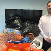 Belmayne partner, Jon Stevens, with some of the items donated to Pathways of Chesterfield last year.